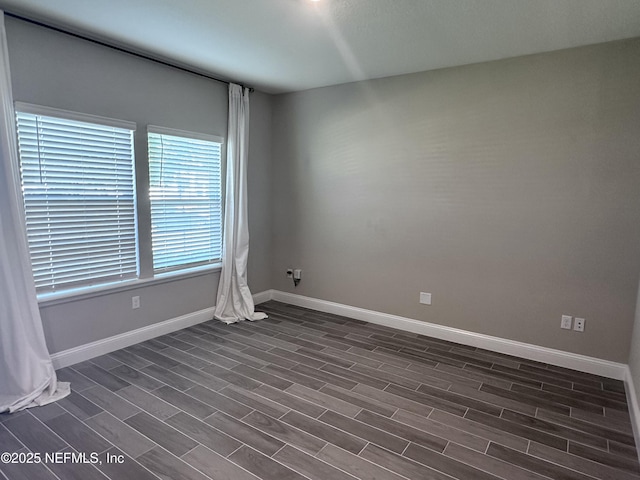 510 Broomsedge Cir, Saint Augustine, FL 32095 - spare room with dark wood-style floors and baseboards