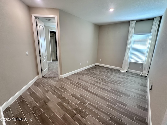 510 Broomsedge Cir, Saint Augustine, FL 32095 - empty room featuring baseboards and dark wood finished floors