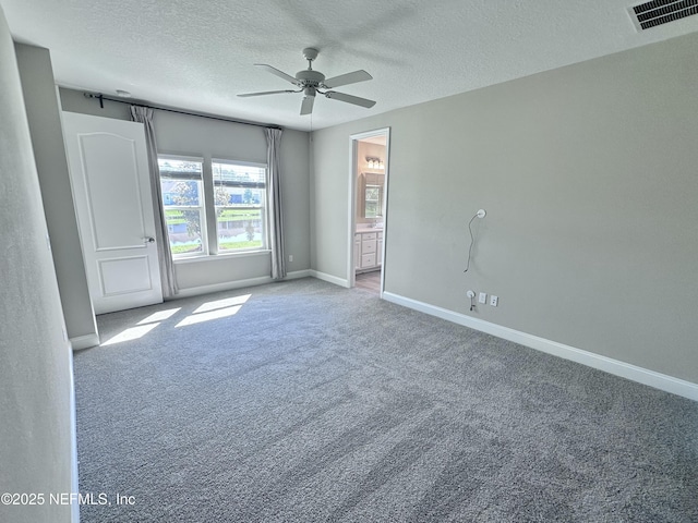 510 Broomsedge Cir, Saint Augustine, FL 32095 - empty room with a ceiling fan, a textured ceiling, carpet floors, and baseboards