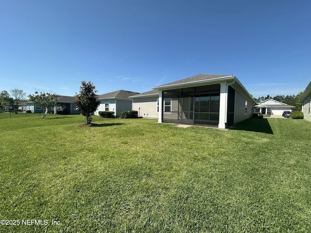 510 Broomsedge Cir, Saint Augustine, FL 32095 - rear view of property featuring a yard and a sunroom