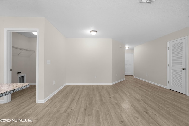 7529 Hare Ave, Jacksonville, FL 32211 - empty room with light wood-type flooring and baseboards