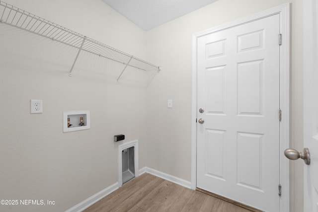7529 Hare Ave, Jacksonville, FL 32211 - laundry area featuring hookup for a washing machine, light wood finished floors, and baseboards
