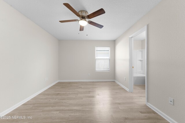 7529 Hare Ave, Jacksonville, FL 32211 - empty room with a ceiling fan, light wood-style floors, and baseboards