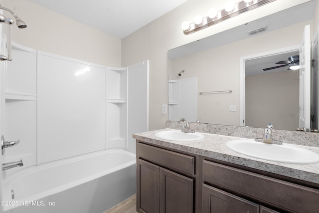 7529 Hare Ave, Jacksonville, FL 32211 - bathroom featuring double vanity and shower / bath combination