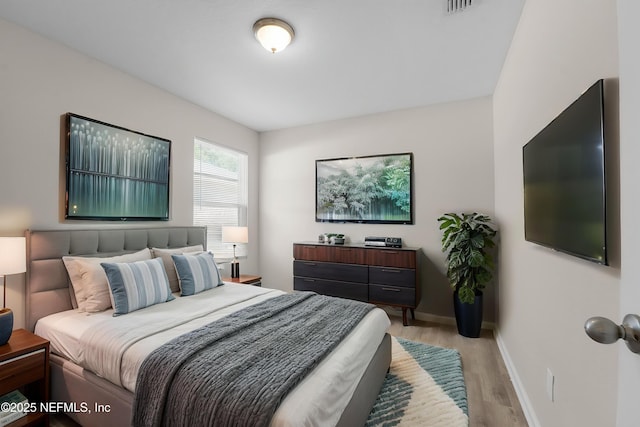 7529 Hare Ave, Jacksonville, FL 32211 - bedroom featuring light wood-style floors and baseboards