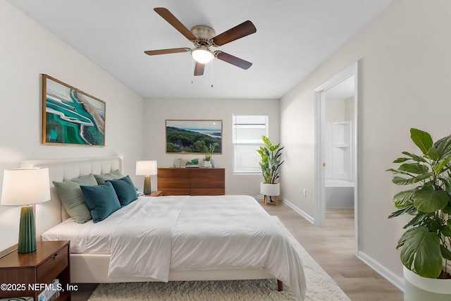 7529 Hare Ave, Jacksonville, FL 32211 - bedroom featuring light wood-type flooring, baseboards, connected bathroom, and a ceiling fan
