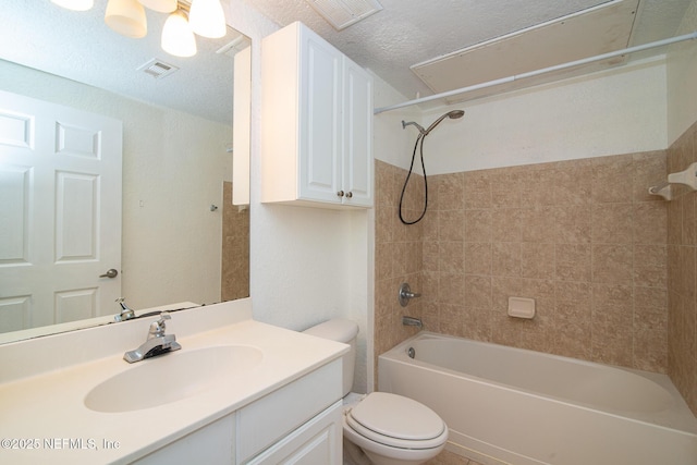 8539 W Gate Pkwy Unit 424, Jacksonville, FL 32216 - full bath with toilet, vanity, washtub / shower combination, and a textured ceiling