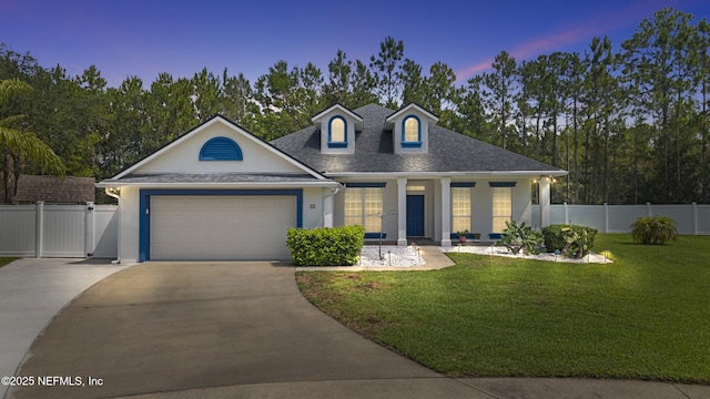204 Lugo Way, Saint Augustine, FL 32086 - view of front of house with concrete driveway, an attached garage, a shingled roof, stucco siding, and covered porch