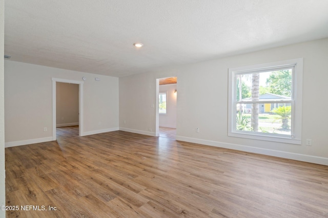 655 Linwood Ave, Jacksonville, FL 32206 - spare room featuring light wood finished floors, baseboards, and recessed lighting