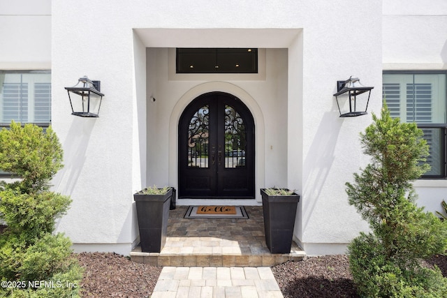 465 Deer Valley Dr, Ponte Vedra, FL 32081 - view of exterior entry with french doors and stucco siding