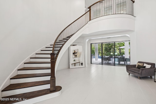 465 Deer Valley Dr, Ponte Vedra, FL 32081 - stairs with arched walkways and a high ceiling