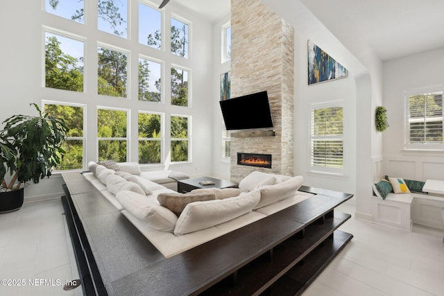 465 Deer Valley Dr, Ponte Vedra, FL 32081 - living area featuring a high ceiling, healthy amount of natural light, and a fireplace