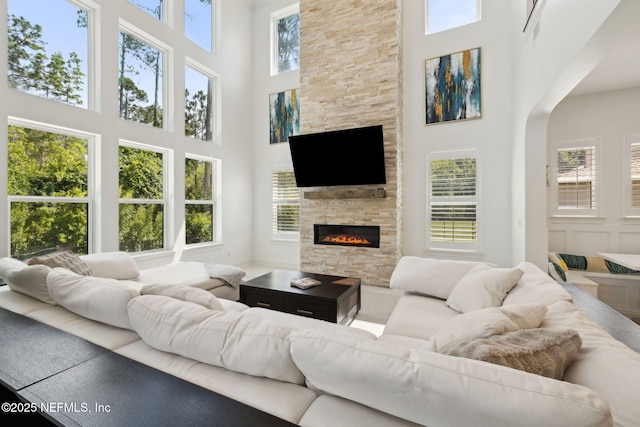 465 Deer Valley Dr, Ponte Vedra, FL 32081 - living room with a high ceiling and a stone fireplace