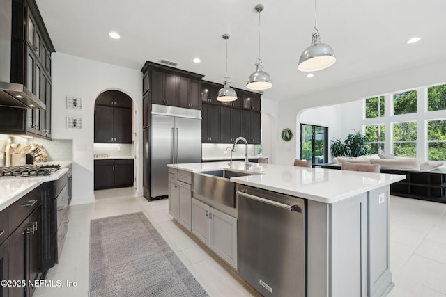 465 Deer Valley Dr, Ponte Vedra, FL 32081 - kitchen featuring appliances with stainless steel finishes, a sink, decorative backsplash, recessed lighting, and light countertops