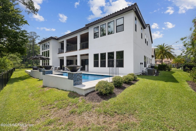 465 Deer Valley Dr, Ponte Vedra, FL 32081 - back of house with an outdoor pool, stucco siding, and central AC