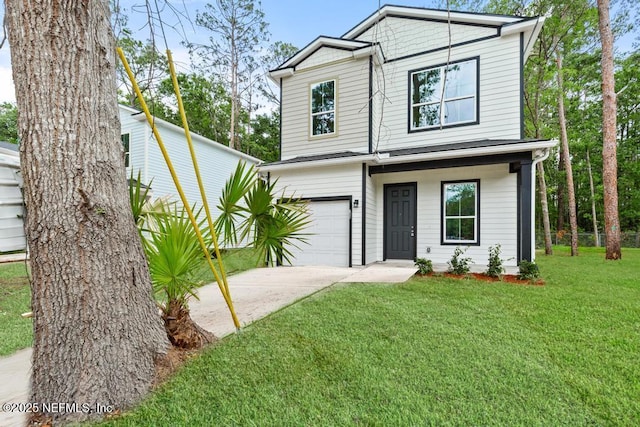 171 Cougar Rd, Jacksonville, FL 32220 - view of front facade with driveway, an attached garage, and a front lawn