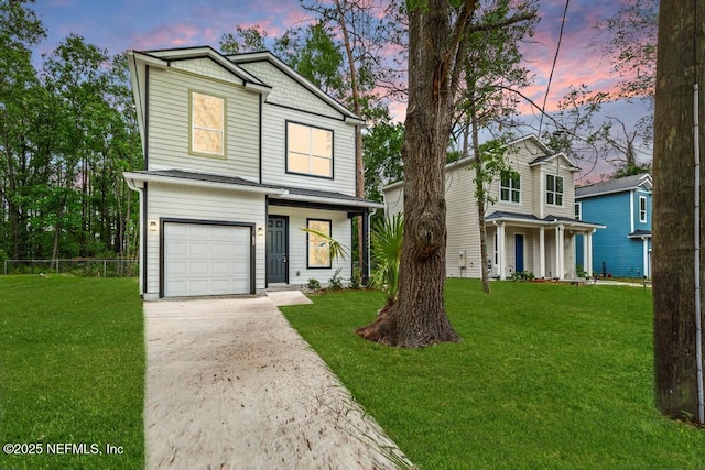 171 Cougar Rd, Jacksonville, FL 32220 - traditional home with a garage, concrete driveway, and a porch