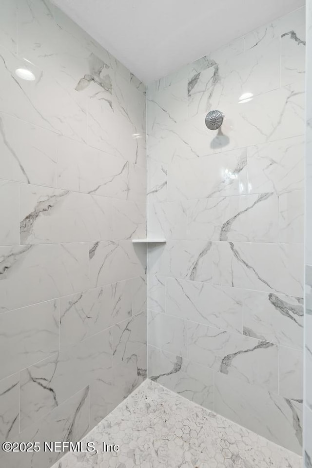7830 Smart Ave, Jacksonville, FL 32219 - bathroom with a marble finish shower