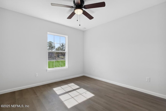 7830 Smart Ave, Jacksonville, FL 32219 - unfurnished room with wood finished floors, baseboards, and ceiling fan
