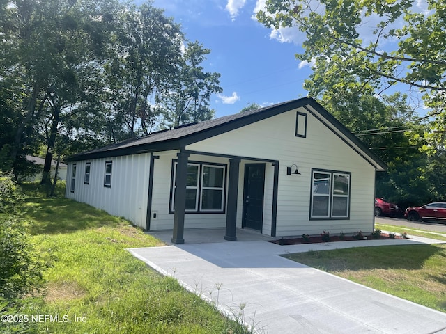 1046 Line St, Jacksonville, FL 32209 - view of front of property with a porch and a front lawn