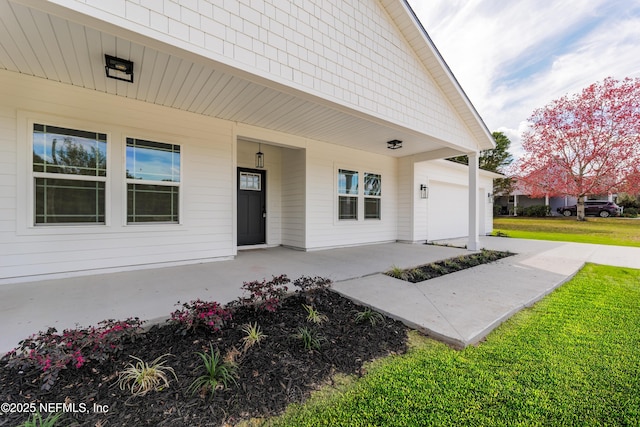 6249 Blue Marlin Dr, Keystone Heights, FL 32656 - doorway to property featuring an attached garage