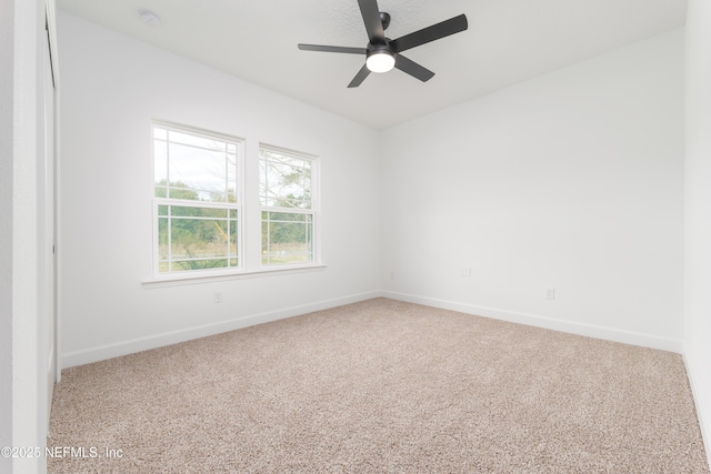 6249 Blue Marlin Dr, Keystone Heights, FL 32656 - empty room with carpet floors, baseboards, and a ceiling fan