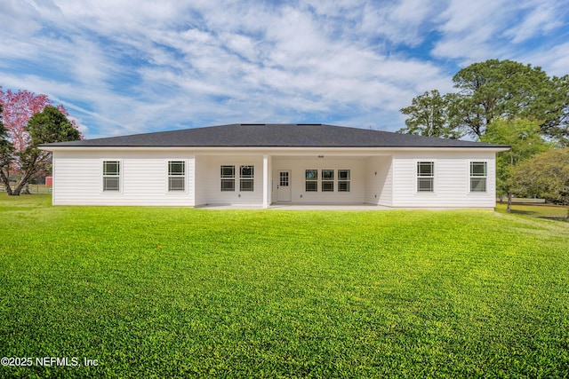 6249 Blue Marlin Dr, Keystone Heights, FL 32656 - rear view of property with a patio and a lawn