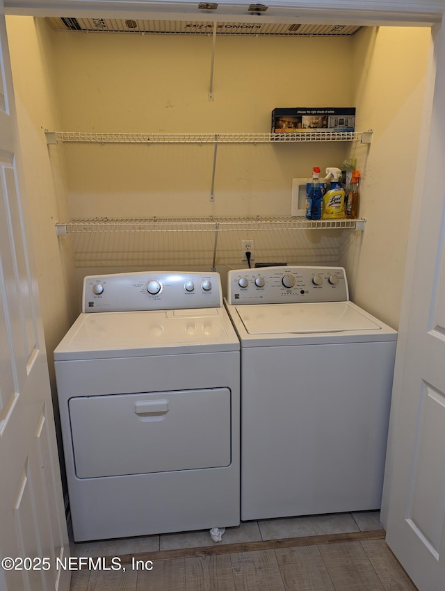 12301 Kernan Forest Blvd Unit 508, Jacksonville, FL 32225 - washroom with washing machine and clothes dryer