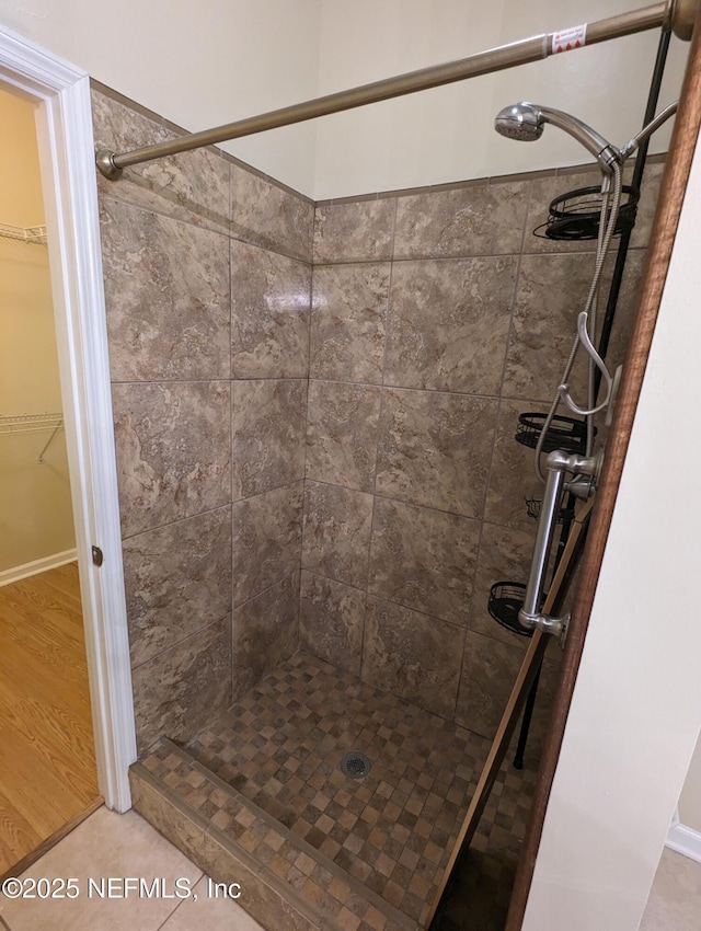 12301 Kernan Forest Blvd Unit 508, Jacksonville, FL 32225 - bathroom featuring a shower stall and a walk in closet