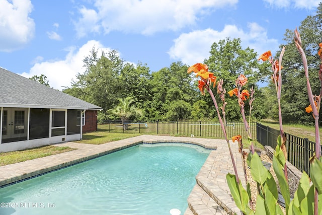 3784 Charles Green Rd, Hilliard, FL 32046 - view of pool featuring a sunroom, a fenced backyard, and view of scattered trees