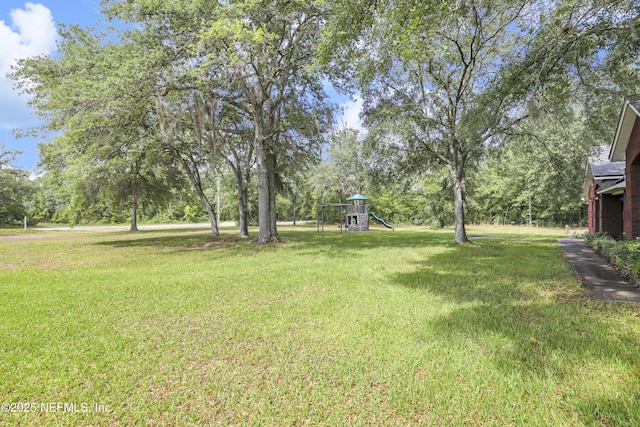 3784 Charles Green Rd, Hilliard, FL 32046 - view of grassy yard featuring view of scattered trees