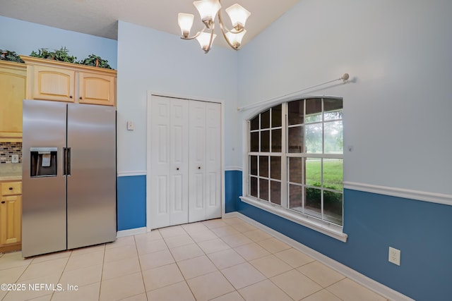 3784 Charles Green Rd, Hilliard, FL 32046 - unfurnished dining area with a chandelier and baseboards