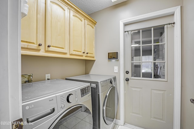 3784 Charles Green Rd, Hilliard, FL 32046 - laundry room featuring cabinet space, independent washer and dryer, tile patterned flooring, and a textured ceiling