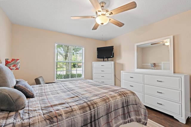 12422 Berry Patch Way, Jacksonville, FL 32225 - bedroom with dark wood finished floors and a ceiling fan