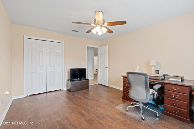 12422 Berry Patch Way, Jacksonville, FL 32225 - office area with a ceiling fan, dark wood-type flooring, and baseboards