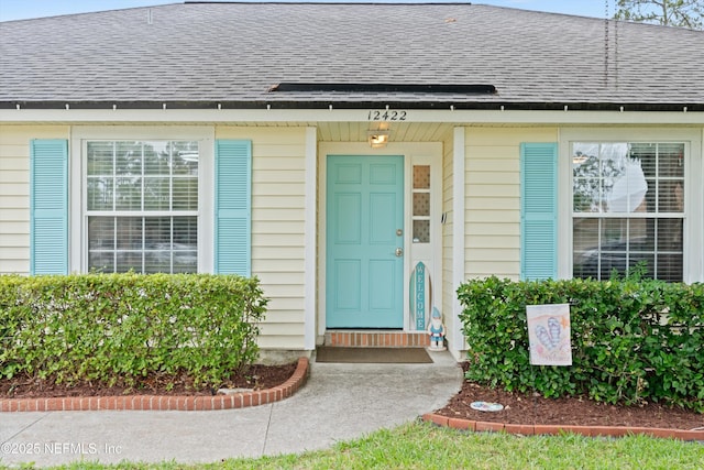 12422 Berry Patch Way, Jacksonville, FL 32225 - doorway to property with a shingled roof