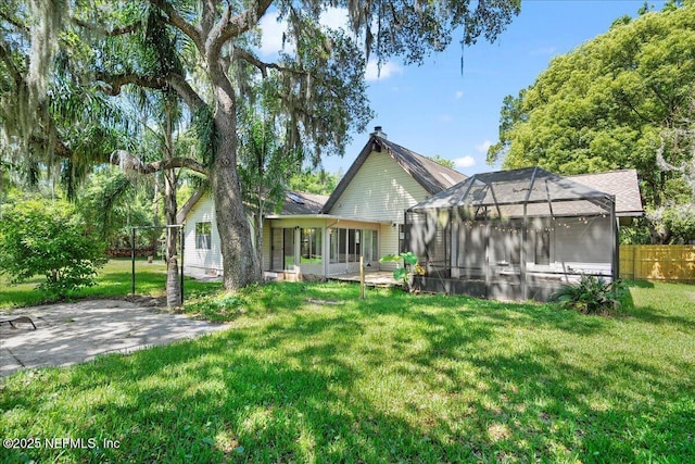 1344 Degrove Rd, Saint Johns, FL 32259 - back of property with a sunroom and a patio