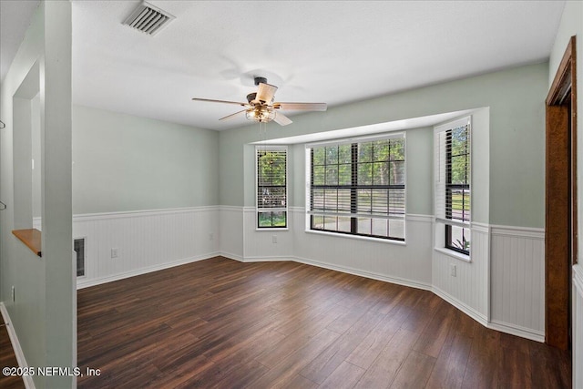 1344 Degrove Rd, Saint Johns, FL 32259 - spare room featuring wainscoting, wood finished floors, and ceiling fan