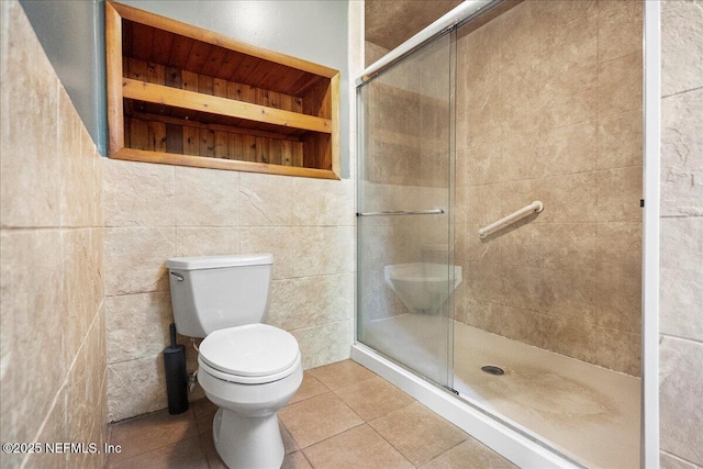 1344 Degrove Rd, Saint Johns, FL 32259 - bathroom featuring toilet, a stall shower, and tile patterned floors
