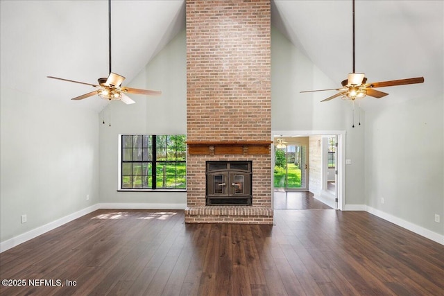 1344 Degrove Rd, Saint Johns, FL 32259 - unfurnished living room with high vaulted ceiling, ceiling fan, wood finished floors, and baseboards