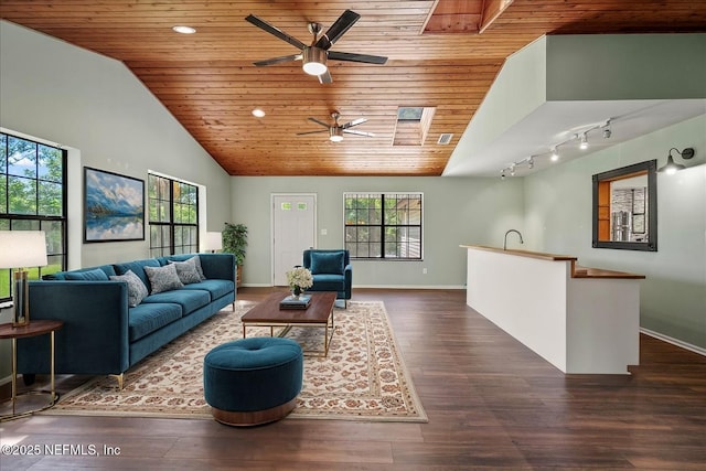 1344 Degrove Rd, Saint Johns, FL 32259 - living area with wooden ceiling, ceiling fan, a skylight, vaulted ceiling, and plenty of natural light