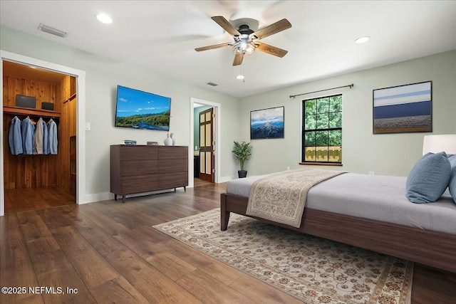 1344 Degrove Rd, Saint Johns, FL 32259 - bedroom with dark wood-style floors, a spacious closet, recessed lighting, ceiling fan, and baseboards