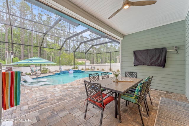 191 Silver Sage Ln, Saint Augustine, FL 32095 - view of swimming pool featuring a patio, a ceiling fan, a lanai, outdoor dining space, and a fenced backyard