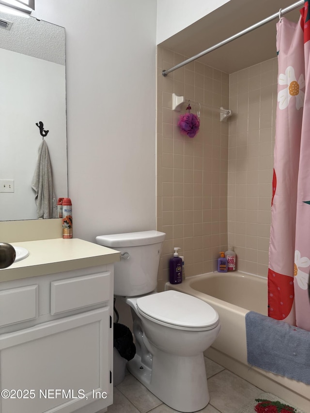 200 Spindrift Ln, Neptune Beach, FL 32266 - bathroom featuring tile patterned flooring, shower / bath combo, vanity, and toilet