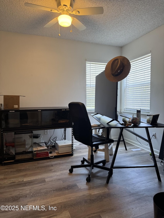 200 Spindrift Ln, Neptune Beach, FL 32266 - office featuring a textured ceiling, ceiling fan, and wood finished floors
