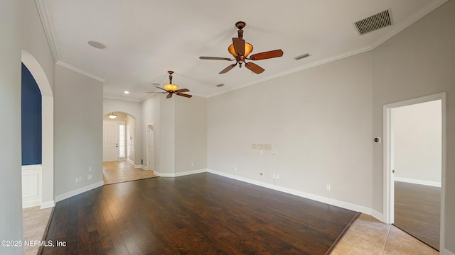 1804 Ferncreek Dr, Saint Augustine, FL 32092 - unfurnished room with arched walkways, a ceiling fan, hardwood / wood-style flooring, ornamental molding, and baseboards