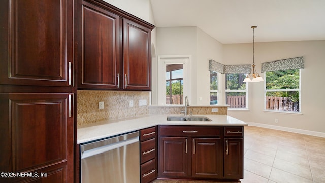 1804 Ferncreek Dr, Saint Augustine, FL 32092 - kitchen featuring stainless steel dishwasher, a sink, light countertops, healthy amount of natural light, and lofted ceiling