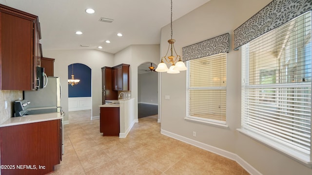 1804 Ferncreek Dr, Saint Augustine, FL 32092 - kitchen featuring a chandelier, electric range, a sink, light countertops, and recessed lighting