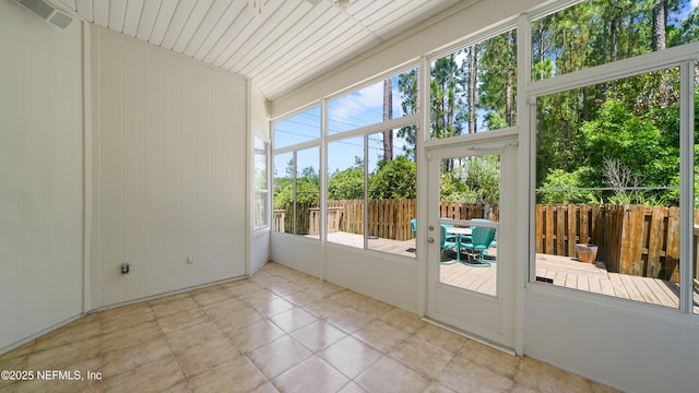 1804 Ferncreek Dr, Saint Augustine, FL 32092 - unfurnished sunroom featuring tile patterned flooring and plenty of natural light