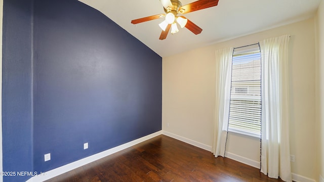 1804 Ferncreek Dr, Saint Augustine, FL 32092 - spare room featuring vaulted ceiling, plenty of natural light, dark wood-type flooring, ceiling fan, and baseboards